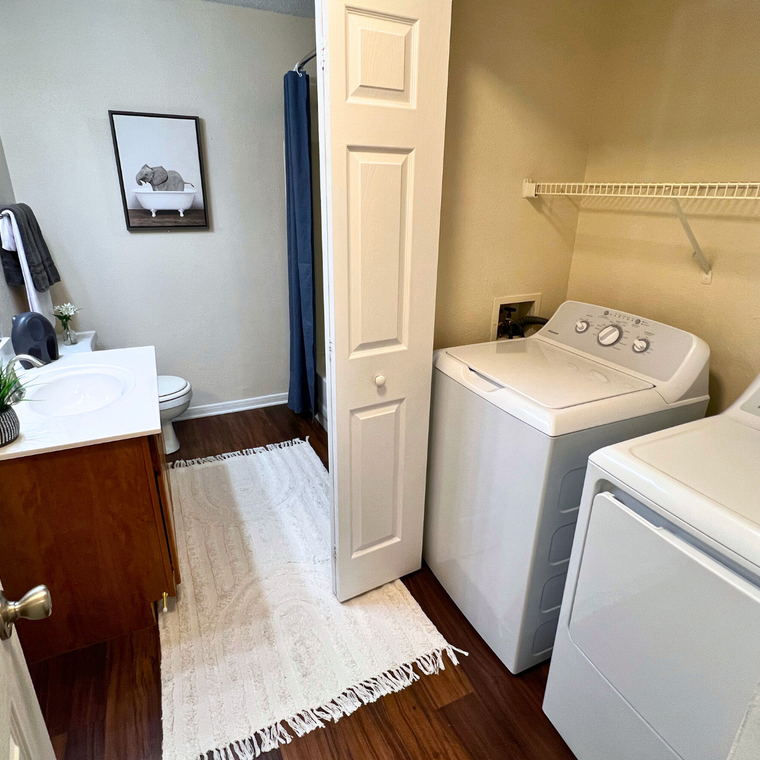 Model Bathroom and Washer/Dryer Closet